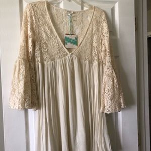 Can be worn as a dress or with leggings